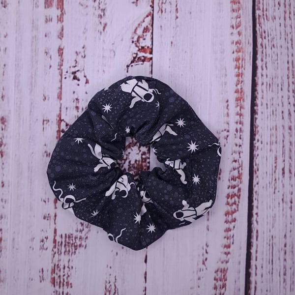 Glow in the dark astronaut scrunchie