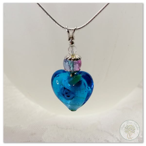 Blue Murano glass heart pendant on a silver plated chain