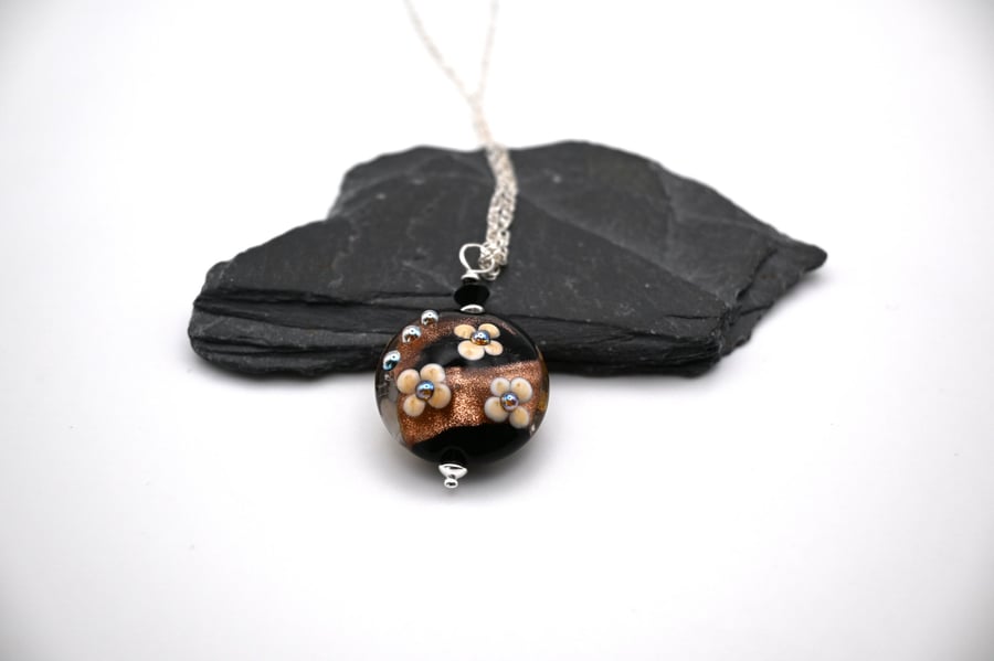 lampwork glass black and goldstone flower pendant necklace
