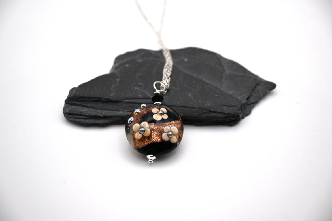 lampwork glass black and goldstone flower pendant necklace