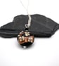 lampwork glass black and goldstone flower pendant necklace