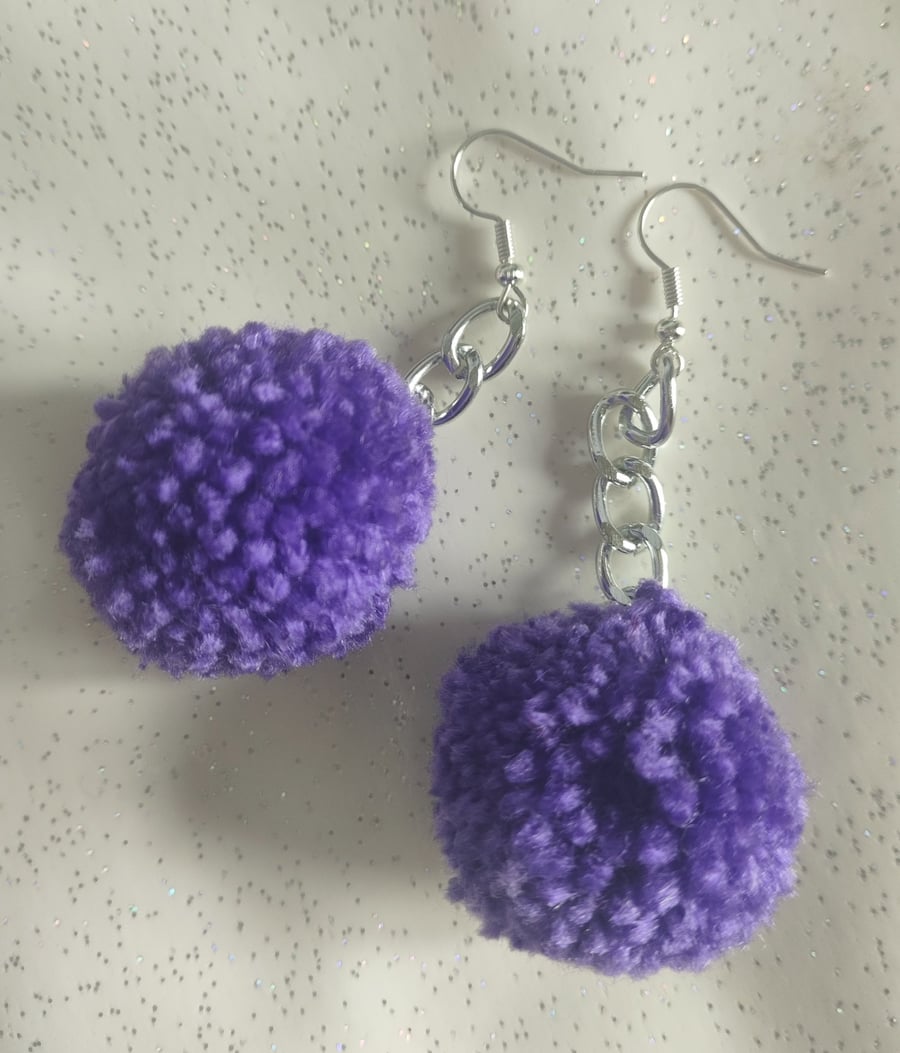 Purple pom-pom earrings
