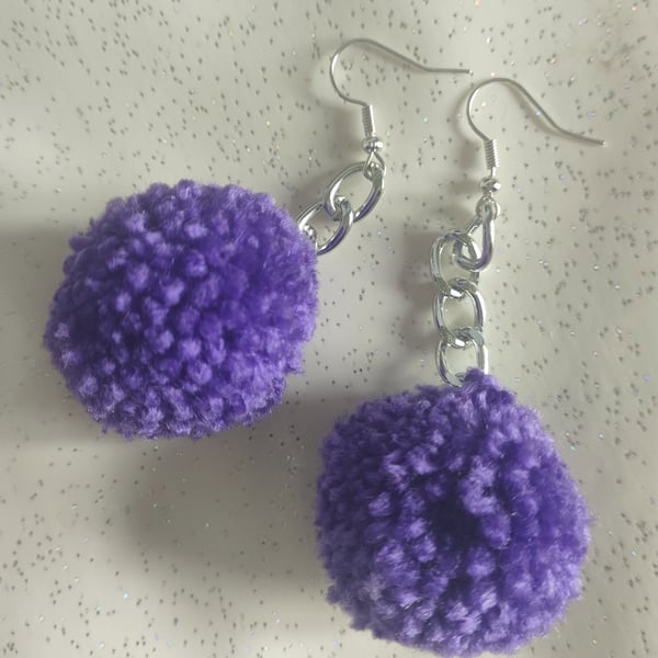 Purple pom-pom earrings
