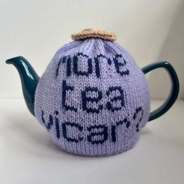 More Tea Vicar? Hand knitted tea cosy with custard cream 