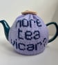 More Tea Vicar? Hand knitted tea cosy with custard cream 
