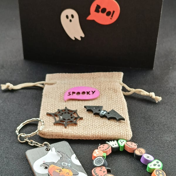 Halloween bracelet and keyring in a gift bag.