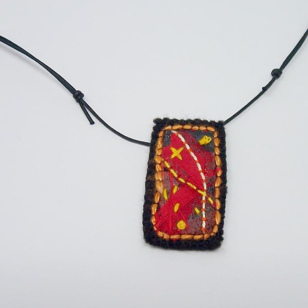 Hand embroidered textile necklace - Flame