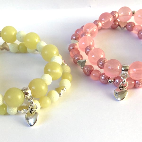 2 bracelet sets Pink and yellow