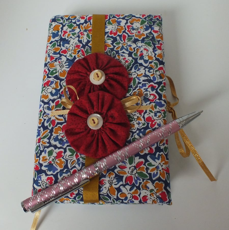 Multi-coloured covered notebook, 