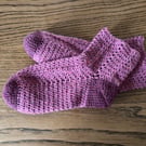 A pair of red crochet recycled wool blend women's ankle socks in UK size 5-6