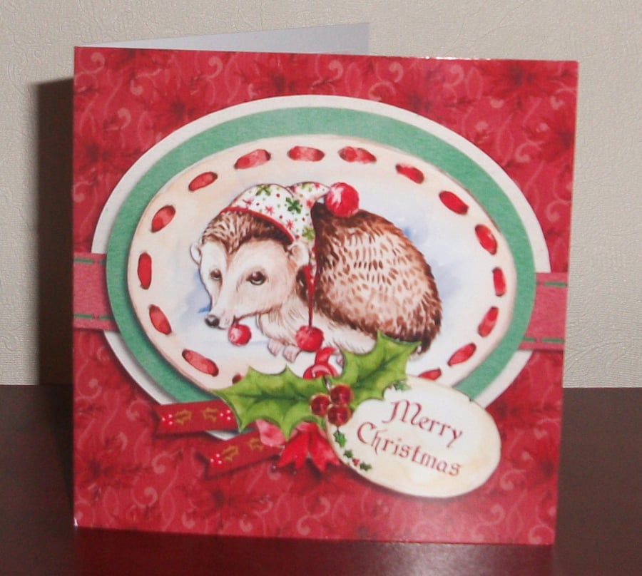 Hedgehog decoupage Christmas card with hand cut decoration and glitter