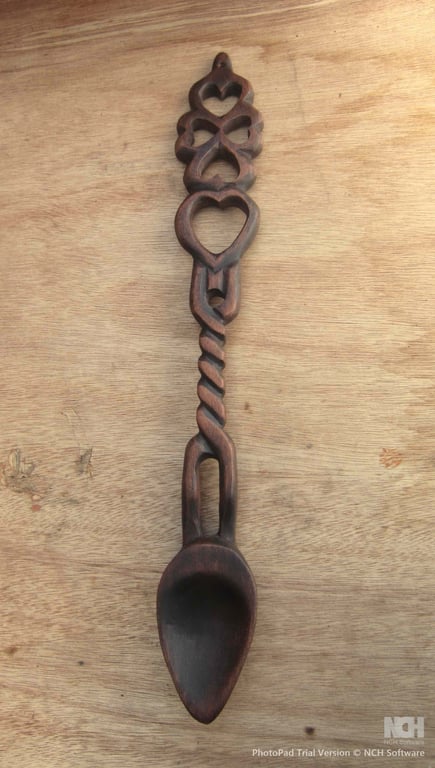 carved wooden lovespoon