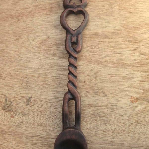 carved wooden lovespoon