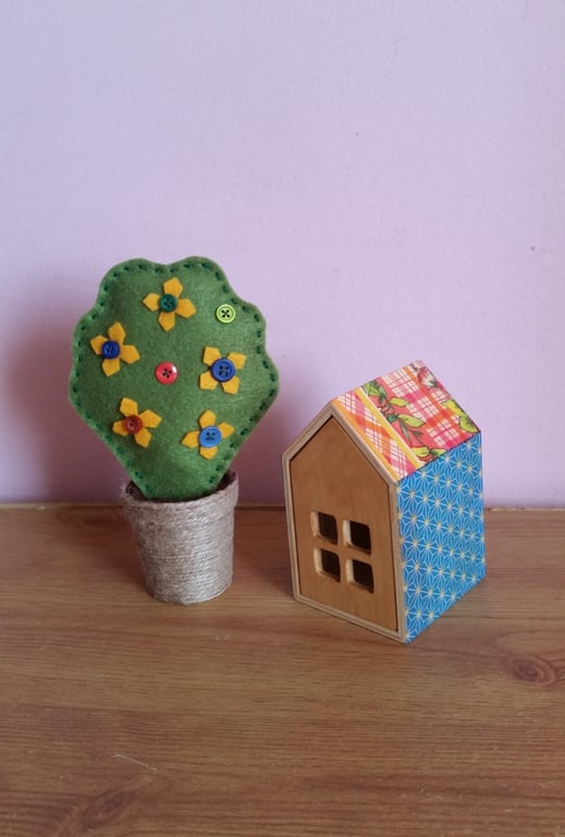 Small wooden house. Home decor. New home gift. Christmas decoration.