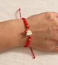 Red Macramé Bracelet with Daisy and Ladybird Charms – Adjustable - Image 4