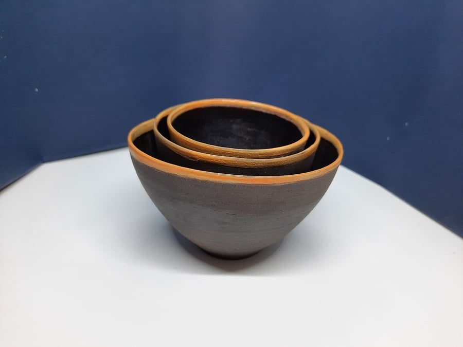  Hand thrown black clay nesting bowls