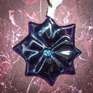 Star shaped light catcher in solid purple fused glass
