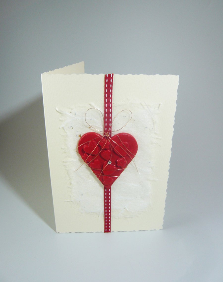 Handmade Valentine's Card. Large heart with tiny heart bead and ribbon.