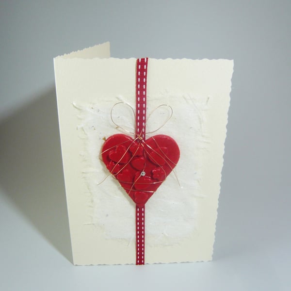 Handmade Valentine's Card. Large heart with tiny heart bead and ribbon.