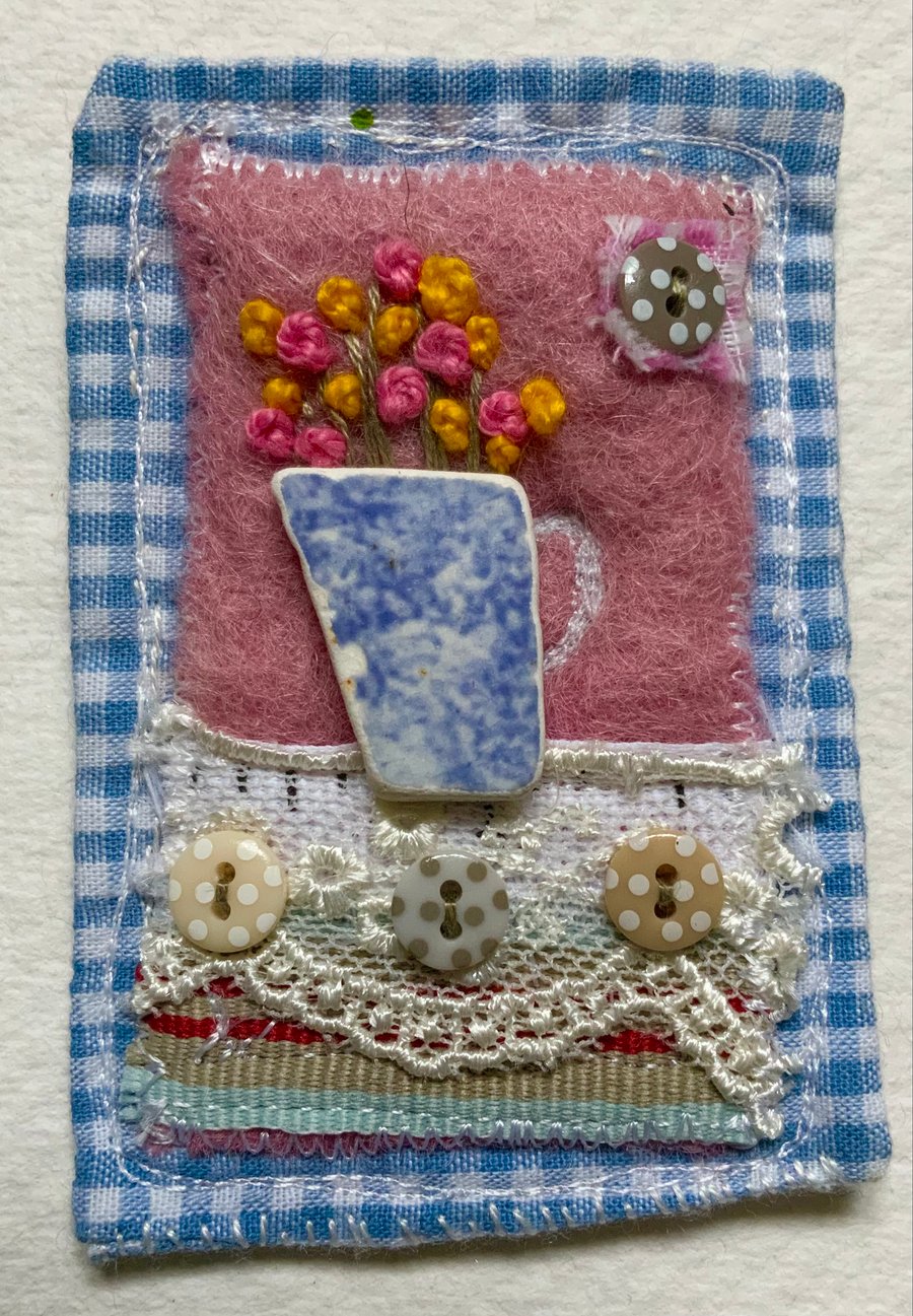 Textile Brooch, jug of flowers