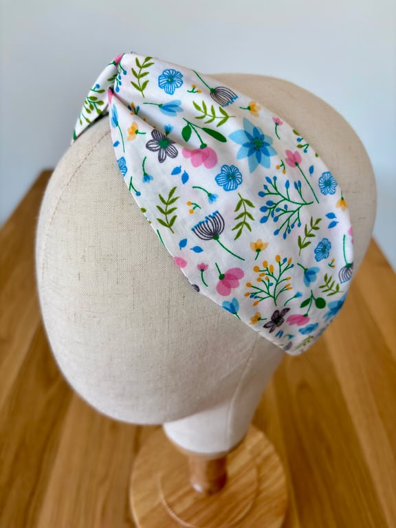 Cotton headband, twist knot style hairband in a white, pink & blue floral design