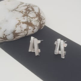 Cruces by Fedha - irregular, hashtag-shaped sterling silver stud earrings 