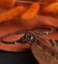 Macrame bracelet with turquoise in brown - Image 1
