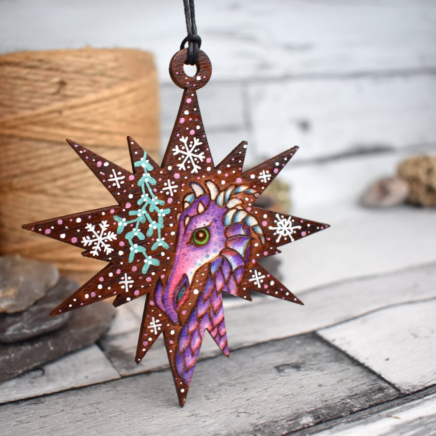 Dragon with mistletoe hanging star. Pyrography personalised decoration.