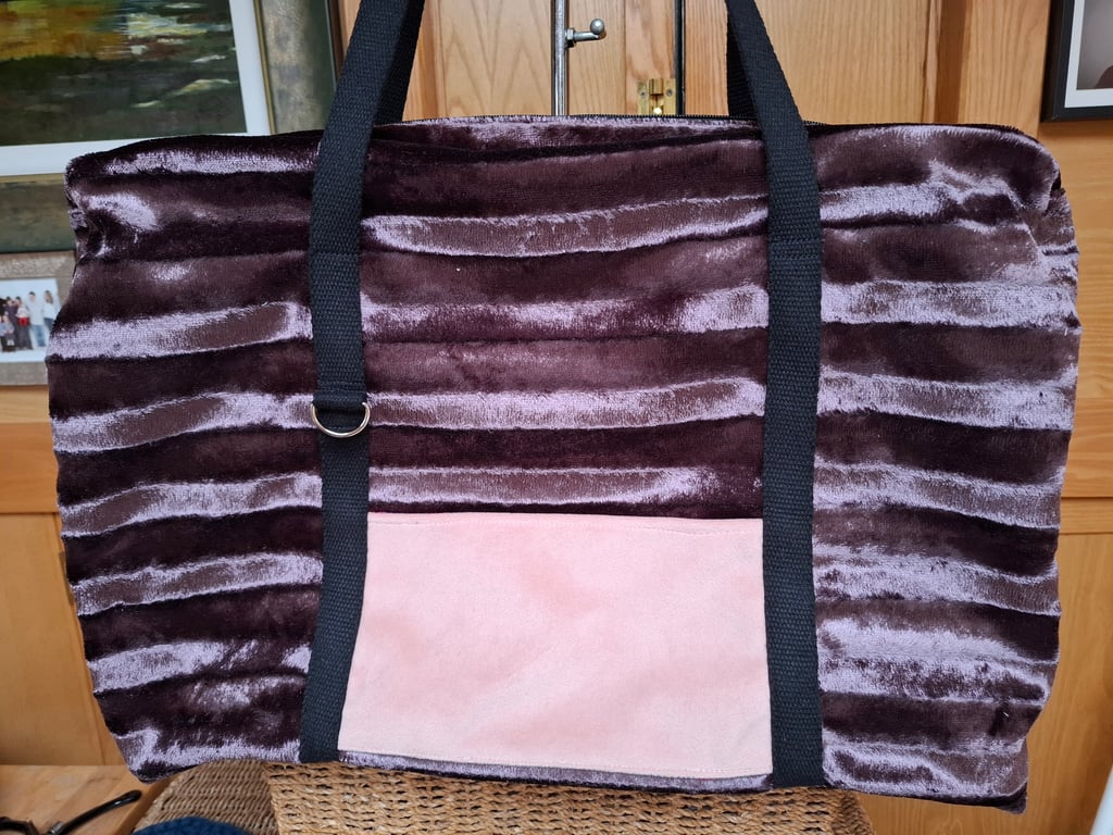 Purple velvet holdall