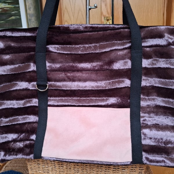Purple velvet holdall