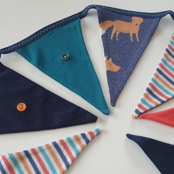 Rich Teal, Navy, Red Fox Bunting on Navy Binding with Button Detail. 