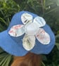 Women's denim Baker boy cap with decorative flower detail - Image 2