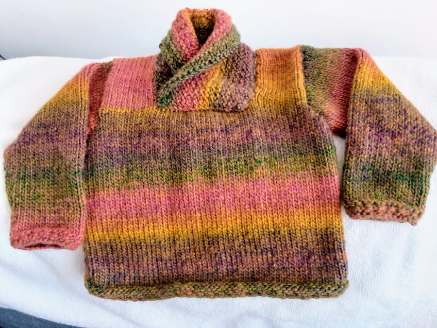 Second size Baby Jumper in autumn colours