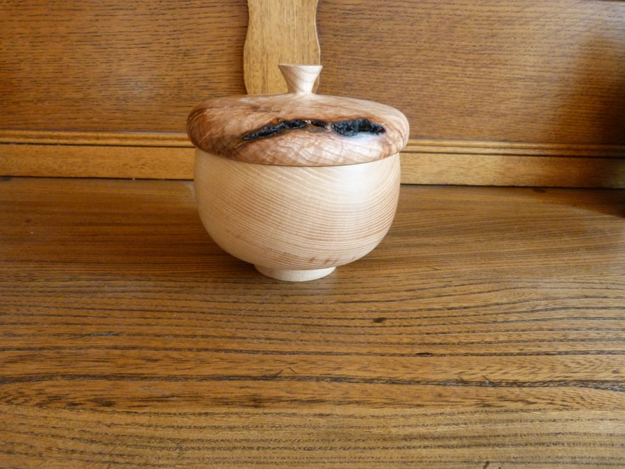Ash lidded container