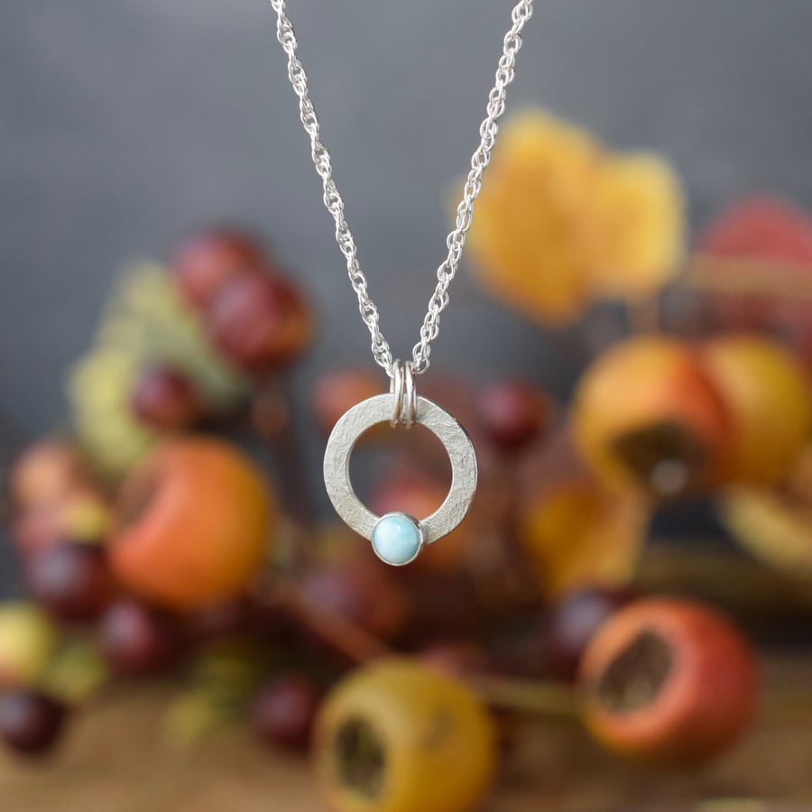 Sterling silver circle pendant with larimar gemstone