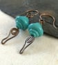 Copper earrings with teal lamp work bead and wire work - Image 4