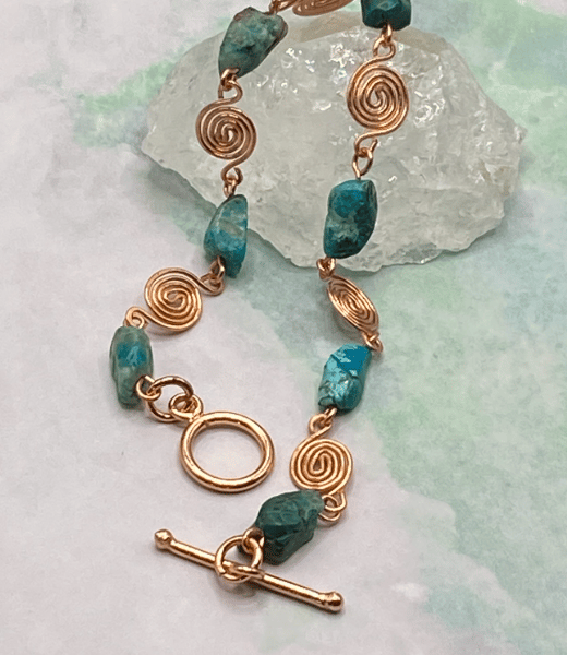 Chrysocolla stone bracelet with rose gold tone wirework