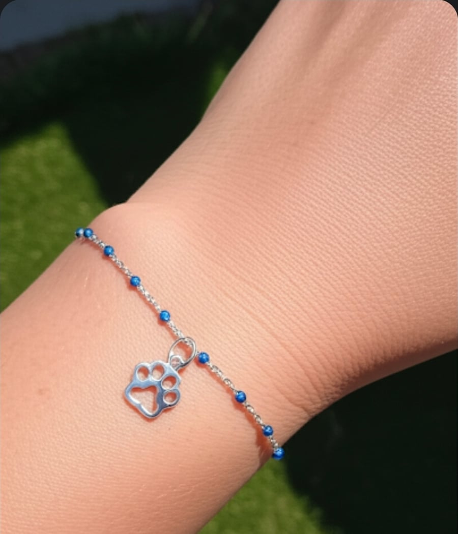 Kindred Spirit: Silver & Blue Enamel Paw Print Bracelet