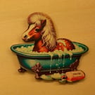 Shetland Pony taking his bath. whimsical wooden brooch.