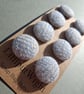 Set of eight scrap bag buttons - baby blue and oatmeal Harris Tweed - Image 1
