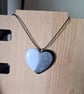 Handmade resin heart pendant on  black waxed cord