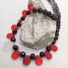 Black Beaded Necklace with Red and White Faceted Drop Beads