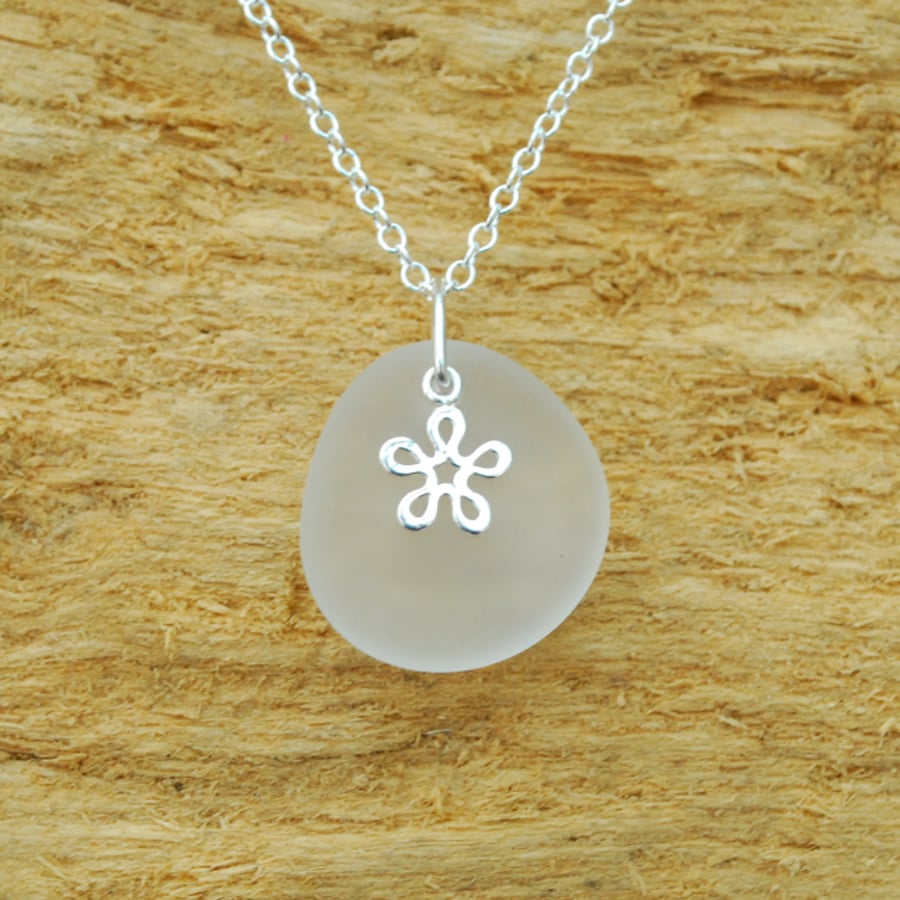 Little white beach glass pendant with silver flower 