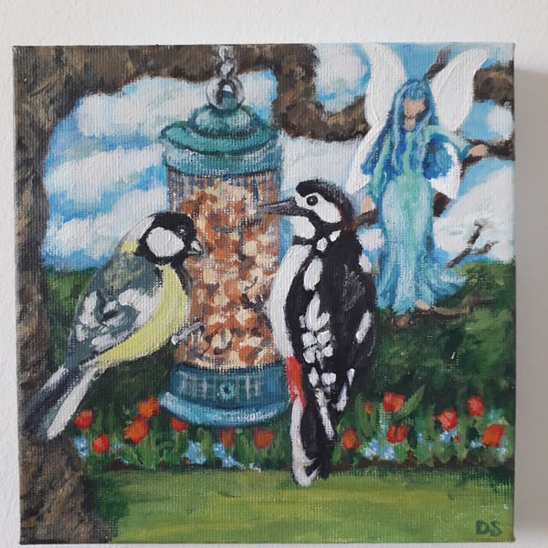 Fairy friends original painting. Two garden birds on a feeder with a fairy 