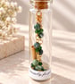 Tree Agate and Emerald Crystal Bracelet in a message bottle.