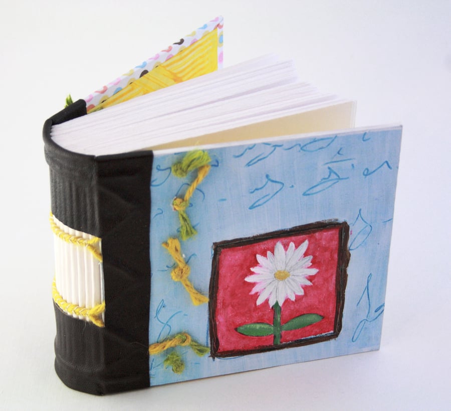  Chunky Journal, Quarterleatherbinding, with a leather spine and painted front c