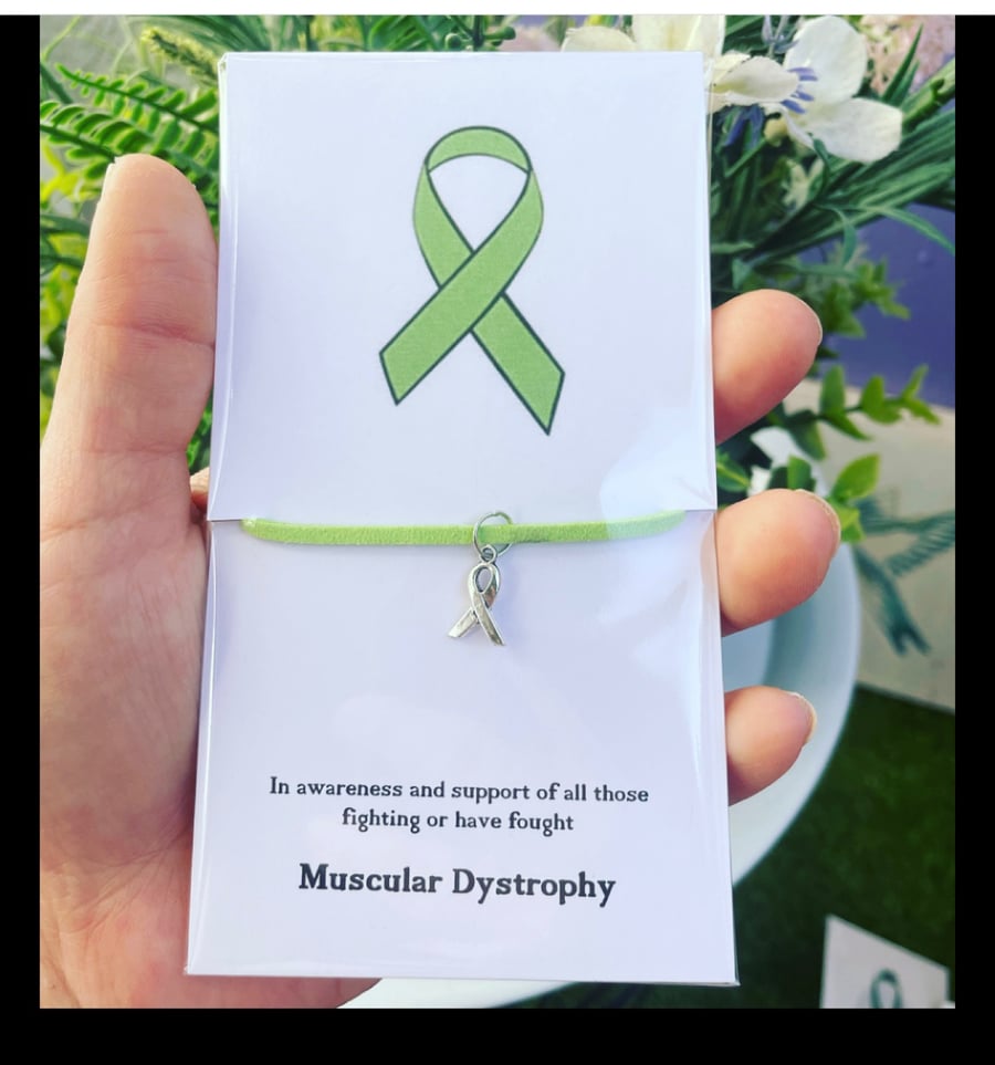 In awareness and support of muscular dystrophy awareness wish bracelet charm 