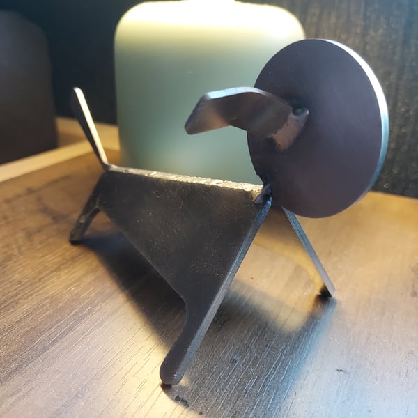 Handcrafted Industrial metal dog sculpture figurine.
