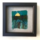 Framed handwoven tapestry weaving, textile art in blue, green and yellow