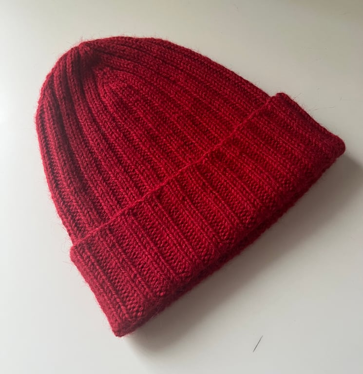 Red women's hat. Size 56 cm. Hand knitted.